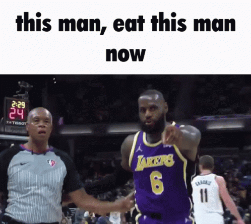 A Basketball Player In A Lakers Jersey Is Pointing At The Camera GIF