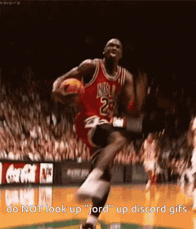 A Basketball Player In A Red Jersey With The Number 23 On It Is Jumping In The Air GIF