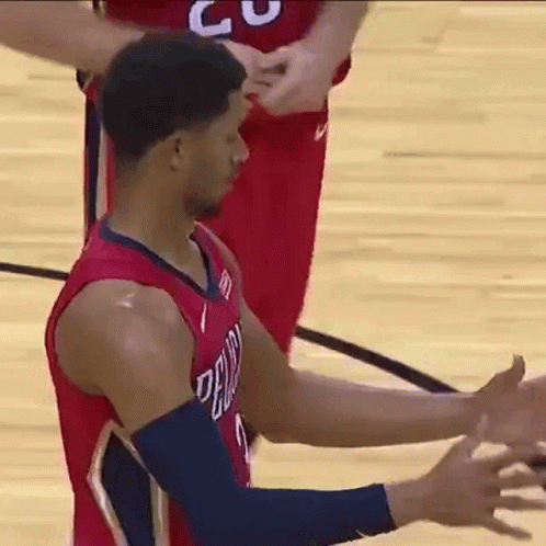 A Basketball Player In A Red Jersey With The Number 5 On It GIF