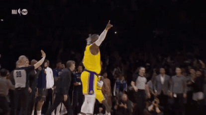 A Basketball Player In A Yellow Jersey With The Number 6 On It Is Dancing On The Court . GIF