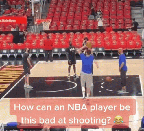 A Basketball Player Is Getting Ready To Shoot A Ball On A Court GIF