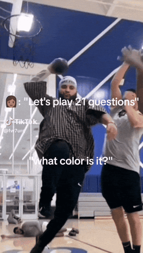 a basketball player is jumping in the air with the caption " let 's play 21 questions what color is it "