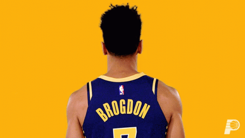 A Basketball Player Named Brogdon Flexes His Muscles GIF