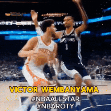 A Basketball Player Named Victor Wembenama Is Jumping In The Air GIF