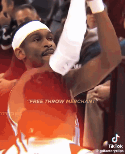 A Basketball Player Says " Free Throw Merchant " While Holding Up His Arm GIF