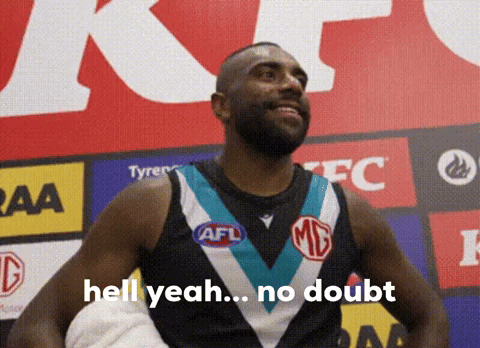 a basketball player says hell yeah no doubt in front of a kfc sign