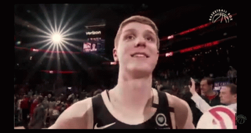Basketball Player In Front Of Crowd And Verizon Sign GIF