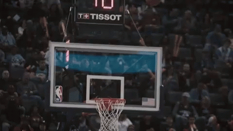 A Basketball Player Wearing A Black Jersey With The Word Chicago On It Is Standing On A Court . GIF