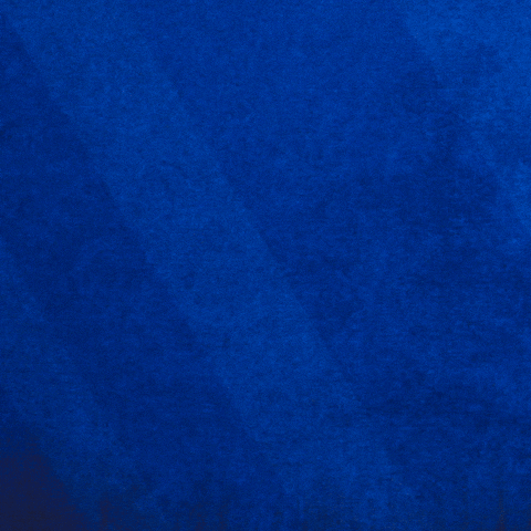 A Basketball Player Wearing A Blue Byu Jersey Number 3 GIF