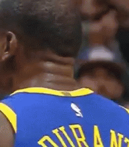 A Basketball Player Wearing A Blue Jersey With The Name Durant On It GIF