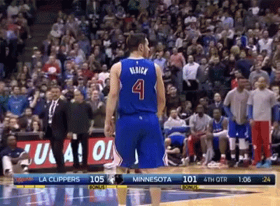A Basketball Player Wearing A Blue Jersey With The Number 4 On It GIF