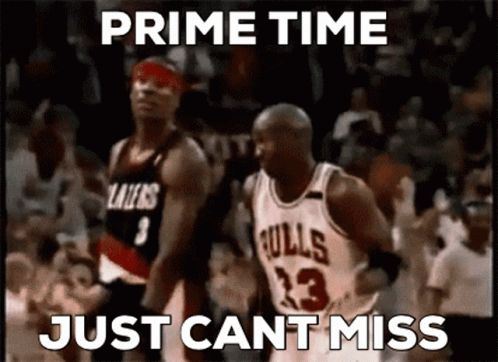 A Basketball Player Wearing A Bulls Jersey Is Being Chased By Another Player GIF