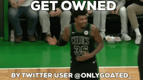 A Basketball Player Wearing A Celtics Jersey Is Dancing On The Court GIF