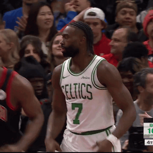 a basketball player wearing a celtics jersey with the number 7 on it