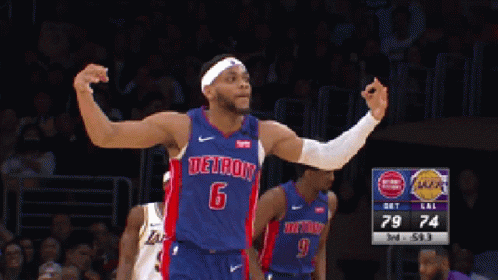 A Basketball Player Wearing A Detroit Jersey Stands On The Court GIF
