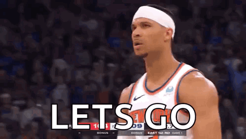 A Basketball Player Wearing A Headband Is Standing In Front Of A Crowd And Says `` Let 'S Go '' . GIF