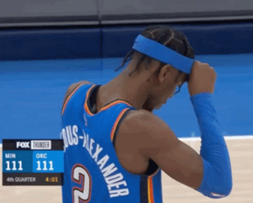 A Basketball Player Wearing A Headband With The Name Alexander On The Back GIF