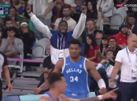 A Basketball Player Wearing A Hellas Jersey Stands On The Court GIF