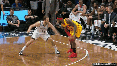 A Basketball Player Wearing A Jersey That Says ' 53 ' On It GIF