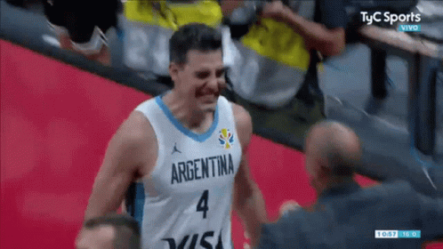 A Basketball Player Wearing A Jersey That Says Argentina 4 GIF