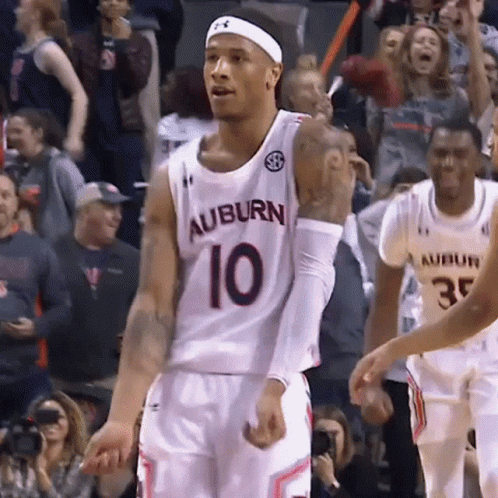 A Basketball Player Wearing A Jersey That Says Auburn 10 GIF