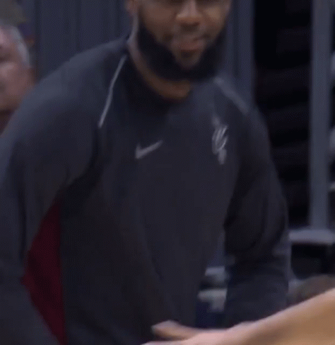 A Basketball Player Wearing A Jersey That Says Cavaliers GIF