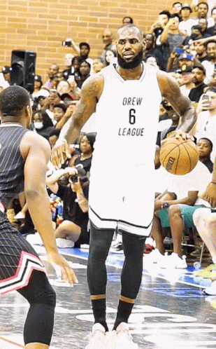 A Basketball Player Wearing A Jersey That Says Drew 6 League GIF