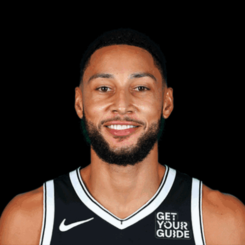 A Basketball Player Wearing A Jersey That Says Get Your Guide On It GIF