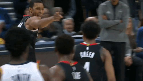 A Basketball Player Wearing A Jersey That Says Green GIF