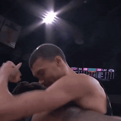A Basketball Player Wearing A Jersey That Says ' Hasse ' On It Is Hugging Another Player GIF