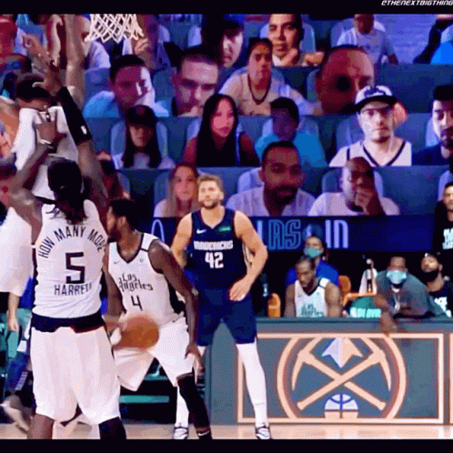 a basketball player wearing a jersey that says " how many more " on it