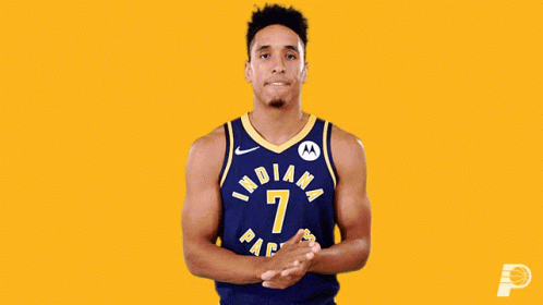 A Basketball Player Wearing A Jersey That Says Indiana 7 GIF