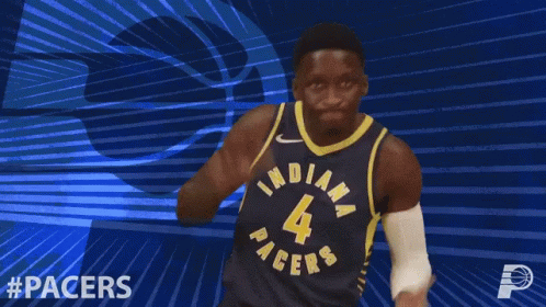 A Basketball Player Wearing A Jersey That Says Indiana On It GIF