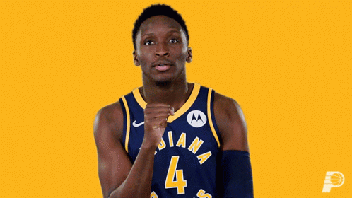 A Basketball Player Wearing A Jersey That Says Indiana On It GIF