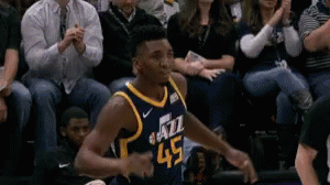 A Basketball Player Wearing A Jersey That Says Jazz 45 GIF