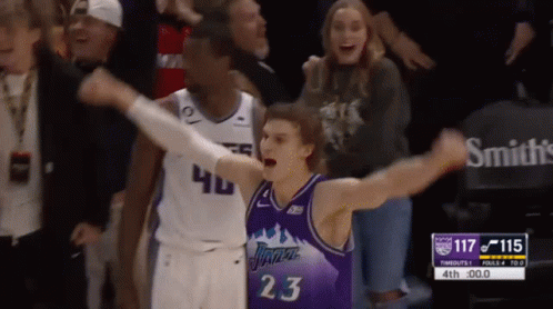 A Basketball Player Wearing A Jersey That Says Jazz On It GIF