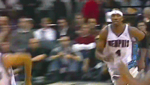 A Basketball Player Wearing A Jersey That Says ' Miami ' On It GIF
