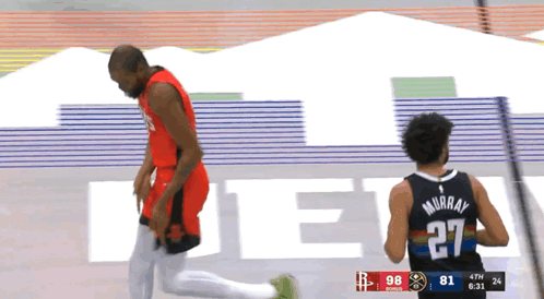 A Basketball Player Wearing A Jersey That Says Murray GIF