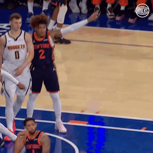 A Basketball Player Wearing A Jersey That Says New York GIF