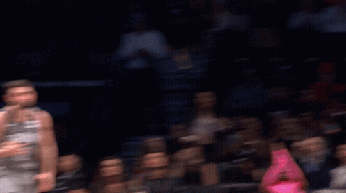 A Basketball Player Wearing A Jersey That Says Raptors 23 On It GIF