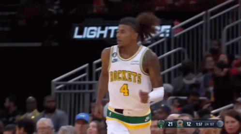 A Basketball Player Wearing A Jersey That Says Rockets GIF
