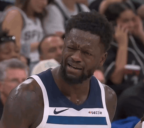 A Basketball Player Wearing A Jersey That Says Sezzle GIF