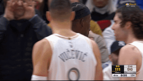 A Basketball Player Wearing A Jersey That Says Vicevic GIF