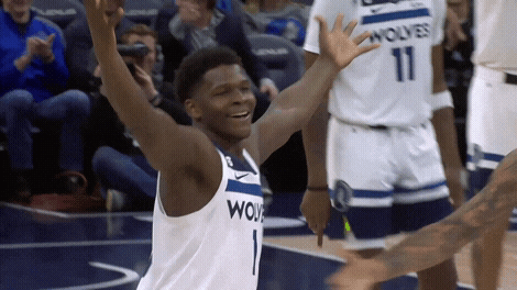 A Basketball Player Wearing A Jersey That Says Wolves GIF