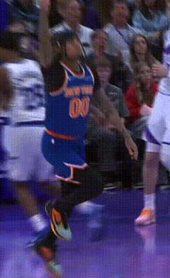 A Basketball Player Wearing A Jersey With The Number 00 GIF