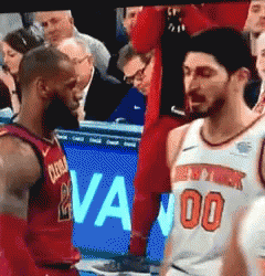 A Basketball Player Wearing A Jersey With The Number 100 On It GIF