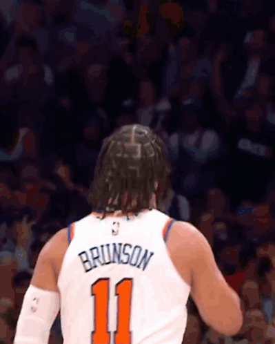 A Basketball Player Wearing A Jersey With The Number 11 On It GIF