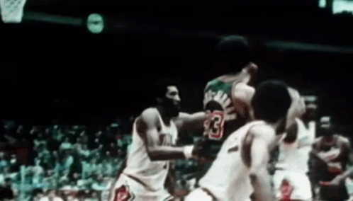 A Basketball Player Wearing A Jersey With The Number 13 On It GIF