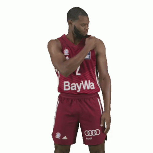 A Basketball Player Wearing A Jersey With The Number 2 On It GIF