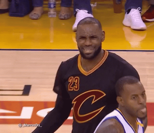 A Basketball Player Wearing A Jersey With The Number 23 GIF